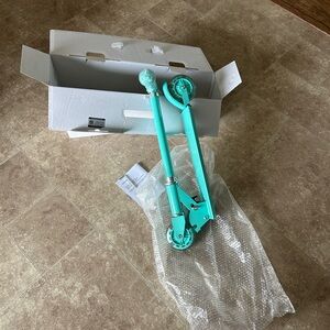 Mint Green Folding Kick Scooter (No Visible Brand)